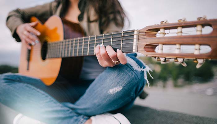 Guitarist performs live music and entertainment at the best restaurant and bar, The Million Roadhouse in Ridgway, Colorado